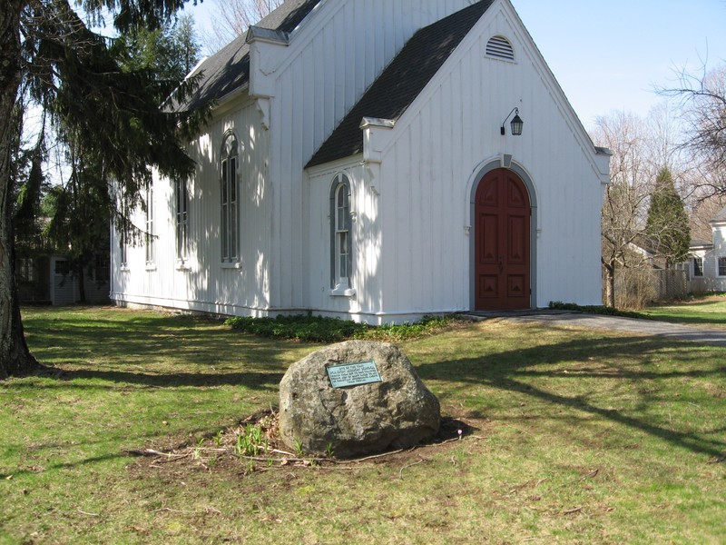 The site of the former school is designated by a small plaque on a rock outside of St. Peter's Lutheran Church. Photo by Michael Herrick, full photo credit below.