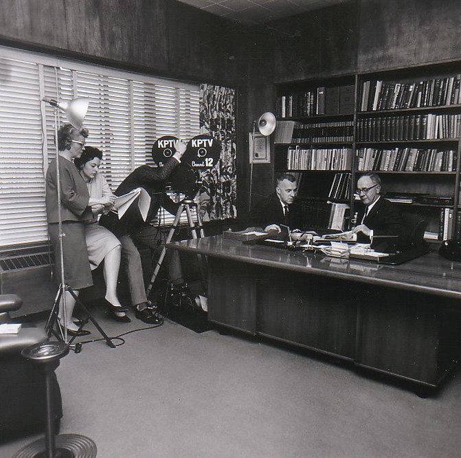 KPTV filming in Dean Baird's office, April 1963. Left to right: Thelma Wilson, Mary Ann Ademino Lockwood, Hal Lesser (KPTV), Ed Arndt (KPTV), Dr. Baird. 