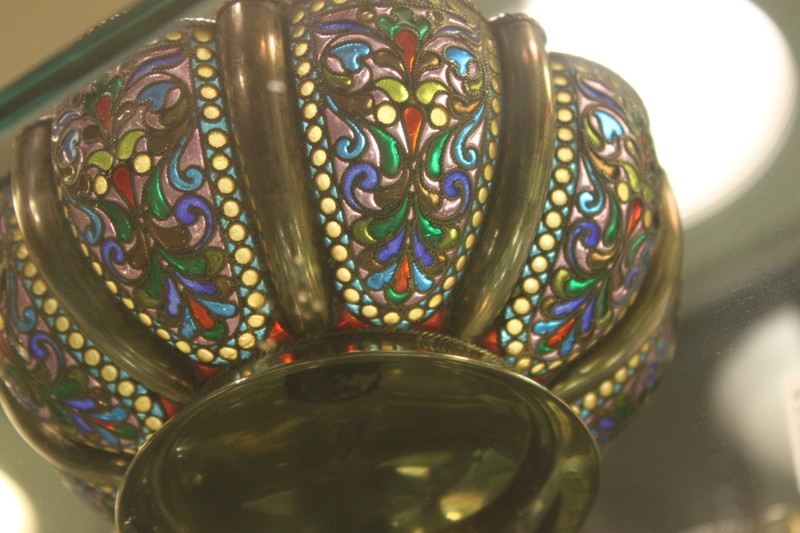 A filigree bowl of gold, silver and translucent enamel resembling stained glass purchased in Moscow. 