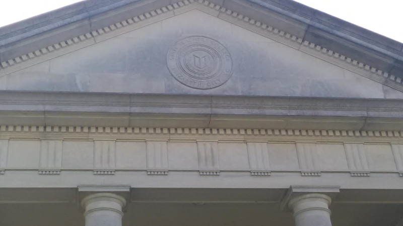 Seal on the front of the Building