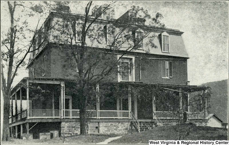 Lockwood House in 1958 with its third floor. Image obtained from the Storer College Digital Collection.