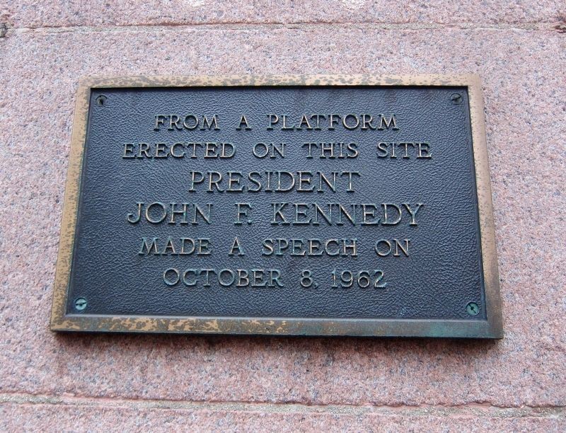 The plaque is located at 100 E 5th street near the entrance to Fountain News.