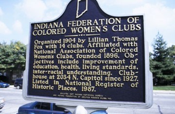 The historical marker next to the building 