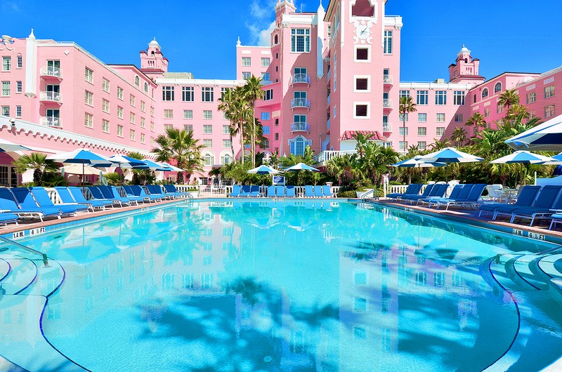 Poolside view of rear-side of building