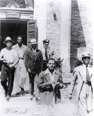 Police arrest Tucker and the four other men after they refused to leave the white-only library.