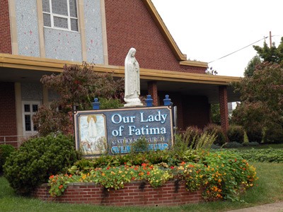 Sign welcoming parishioners to the church