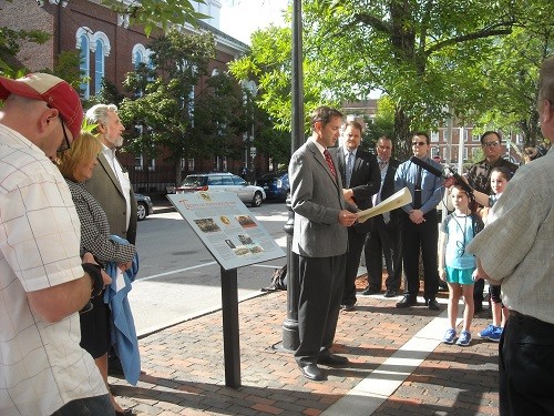 Mayor reading Portsmouth Peace Treaty Day Proclamation.