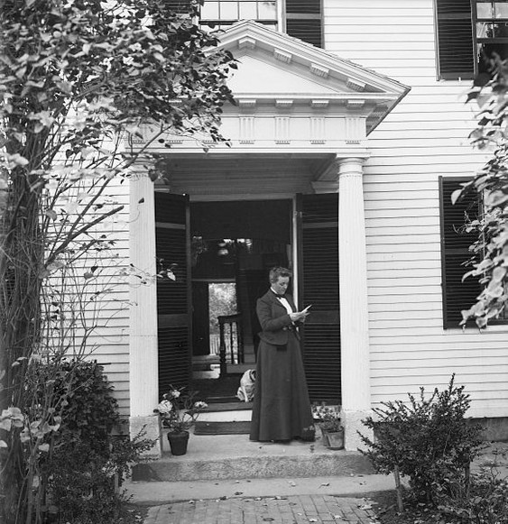 Sarah Orne Jewett standing in the doorway of the house in which she was born in 1849.