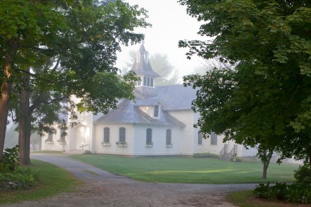 The property's Carriage House shrouded in fog.