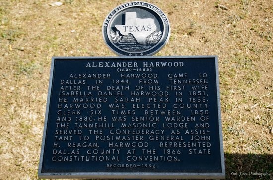 One of many historical markers placed at the graves of notable people who contributed to the development of the city, Alexander Harwood in this instance.