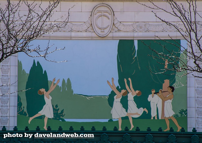 A close-up of the Grecian pastoral mural, painted by H. A. Wheeler, located above the theatre's entrance.