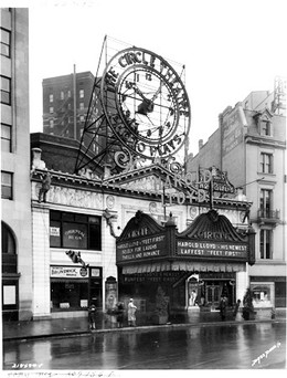 The Hilbert Circle Theatre, circa the early 1930s. The marquee is advertising a "talkie" by Harold Lloyd entitled "Feet First." The huge clock has since been removed.