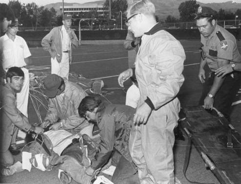 Photo of Wally Benton after his parachute failed to open while skydiving to deliver the game ball on September 11th 1970.
