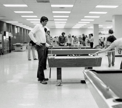 Billiard tables in the game room of the SUB. 