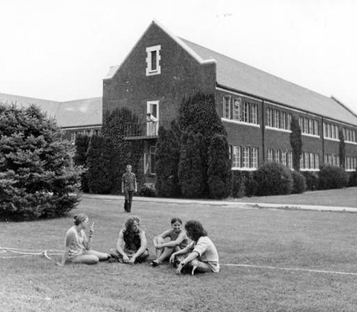 Historic photo of students gathered in front of Morrison Hall 
courtesy of Boise State University