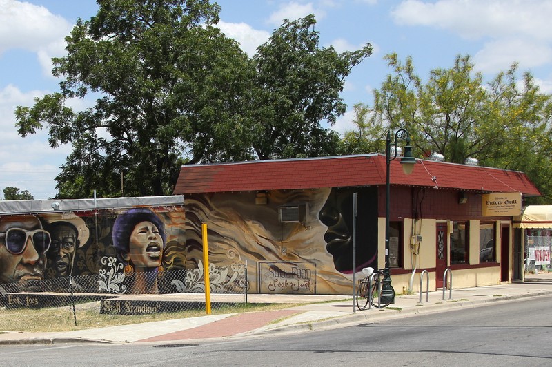 This mural was painted by the artist collective Trust Your Struggle in 2008