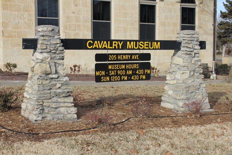 Sign outside the Cavalry Museum illustrating address and operating hours.