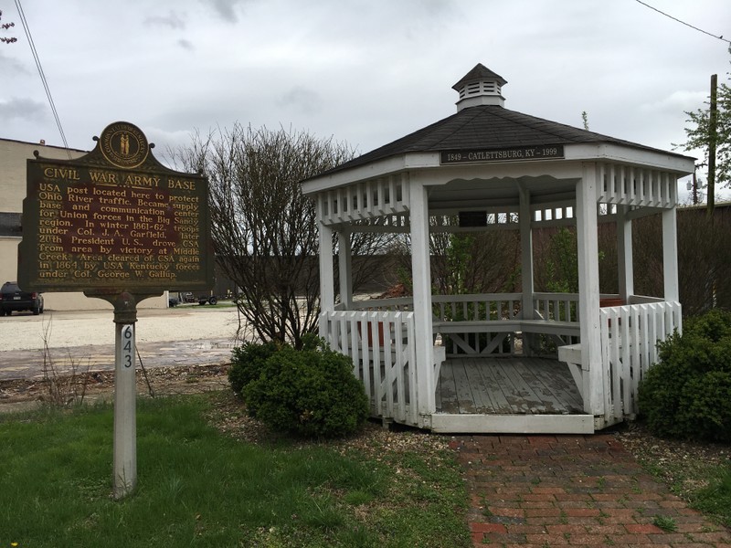 The marker is located next to a white gazebo, pictured here.