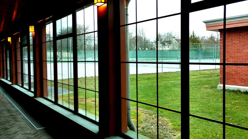 New windows looking out into the tennis courts. This serves as the connector between the Wetmore and Ochre Court structures. Photo taken by Ellen Tuttle.