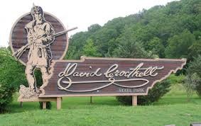 Entrance sign to David Crockett State Park.