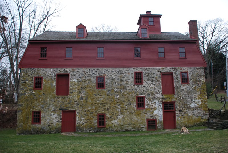 North side of the Newlin Grist Mill. The 2-story stone section on the right-hand side is the original 1704 portion.