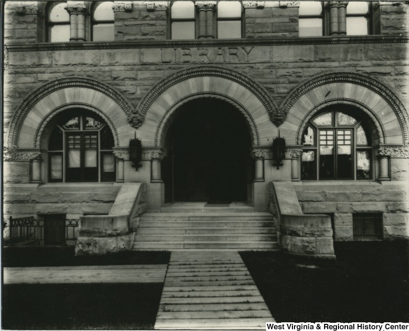 Photo of the facade showing the building's old title of "Library", 1905.