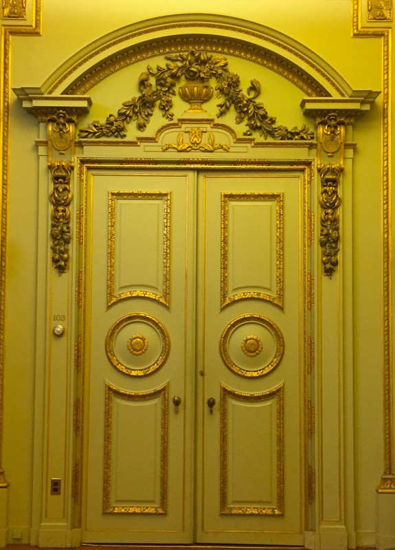 Gilded door on the first floor