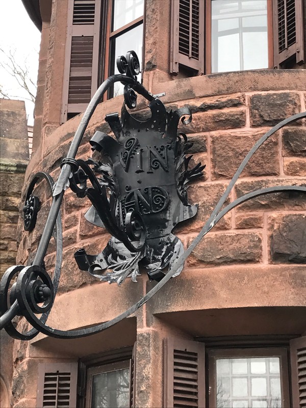 Vinland Estate plaque on the gatehouse.