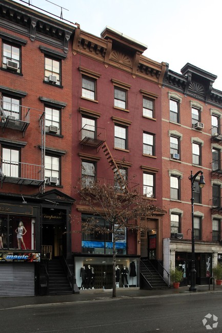 The upper floor of the middle building was the residence shared by Anderson and Heap