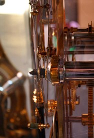 A close-up view of the clock, showing the wooden bear which has remained inside since 1907