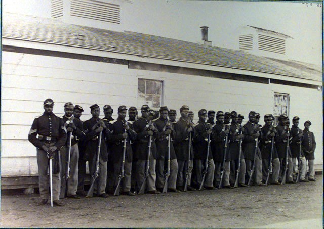 A Photograph of James Adams's unit the 4th U.S.C.T. Infantry Regiment Company E taken at Fort Lincoln, Washington D.C. from U.S. Army Military History Institute, Carlisle Barracks, Full Valley Archive.