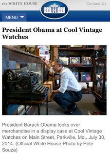 President Barack Obama looks over merchandise in a display case at Cool Vintage Watches on Main Street, Parkville, MO, July 30, 2014. (Official White House photo by Pete Souza)