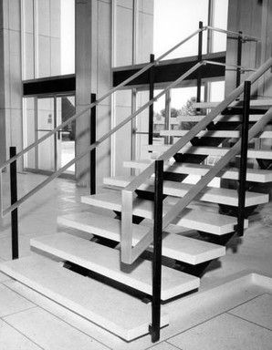 One of two staircases in the main entrance to the library from 1964 to 1993. When the building was remodeled in 1993-95, the entry lobby became the atrium of Albertsons Library.