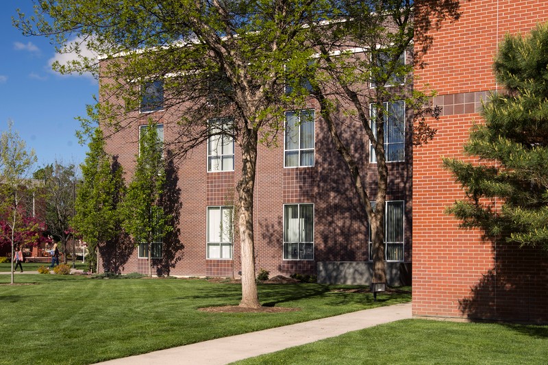 West facing view of the Library showing the difference in brick color of the 1995 addition.