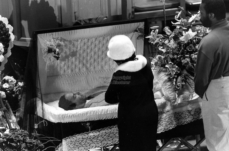 A mourner at the funeral of Huey Newton