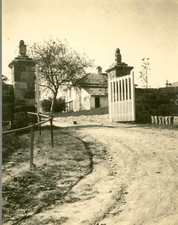 Gate with lions, circa 1920