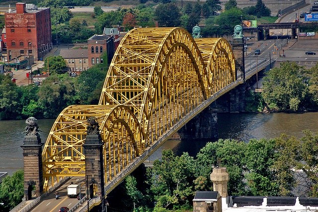 An overhead shot of the triple-arch McCullough Bridge.  Notice the two green and two Black Lentelli sculptures at either end.