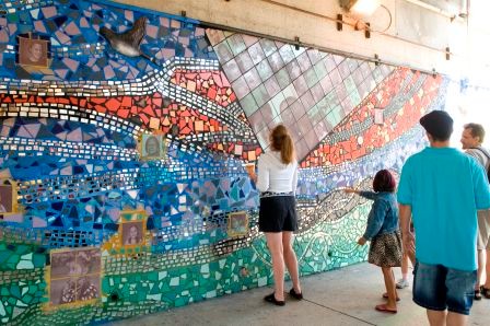 Portion of the mural, showcasing the various forms of media used in its production (Note ceramic tiles, printed images, and mirror pieces). Photo Credit: Al Candelario / Fydagraphy, 2009 (See Klockars article)