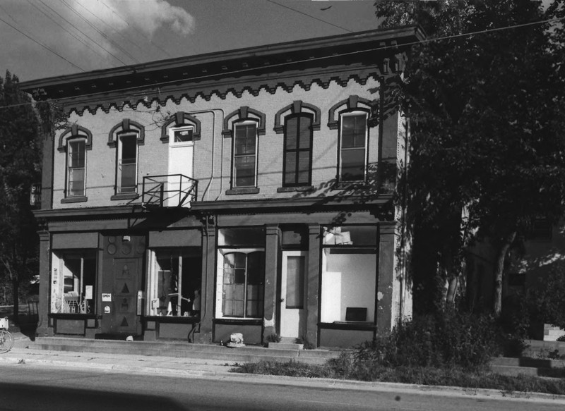 1981 photo of front of Biederstaedt Grocery, with former fire escape, by K. Rankin (Star et al. 1981)