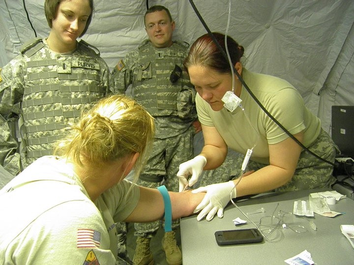 Soldiers of the 111th Engineer Brigade practicing first aid skills during annual summer training.