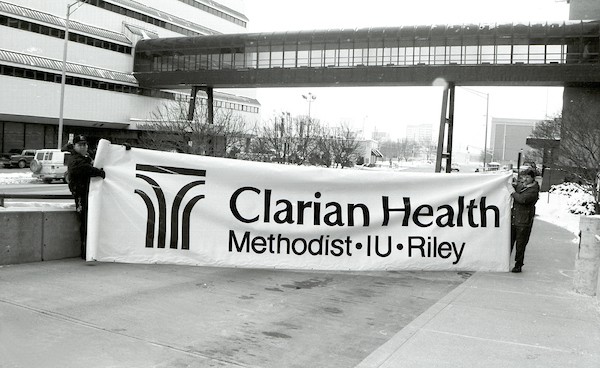 A banner of Clarian Health outside Methodist Hospital
