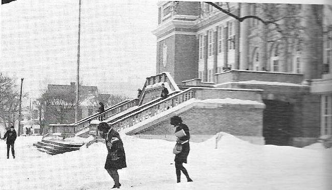 Students outside a snowy HHS in 1970