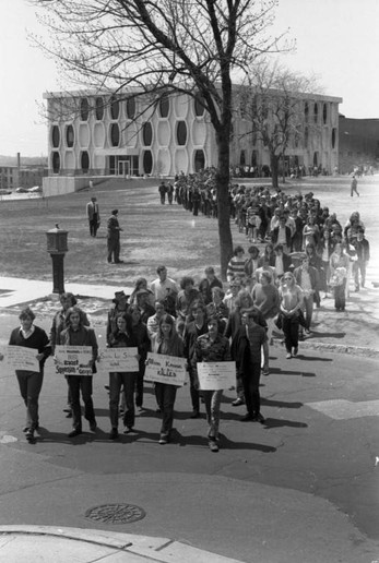 Students protesters form a line departing from Lalumiere Hall, 1970

(“Department of Special Collections and University Archives, Marquette University Libraries, MUA_012867)