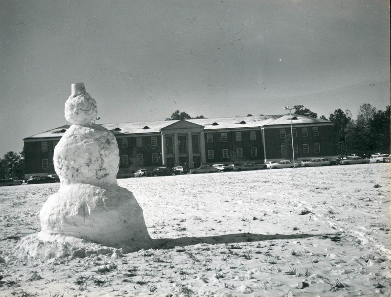 View of Morton Hall with a snowman in the foreground