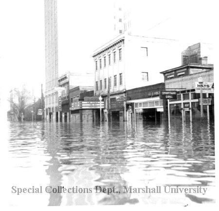 The Roxy and surrounding businesses during the flood of 1937