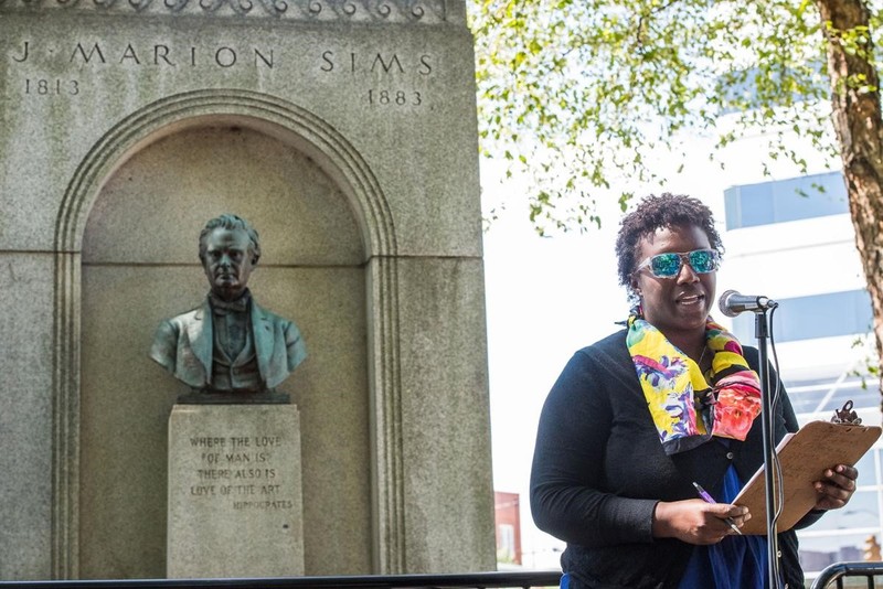 The MEND protest. Trez Drake, University of South Carolina student, participates in the poetry marathon.