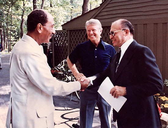 US, Egypt, and Israel meet at Camp David and sign Camp David Accords