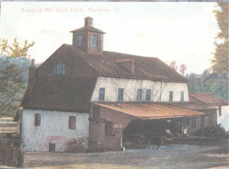 Colorized photo postcard of the back side of the grist mill.