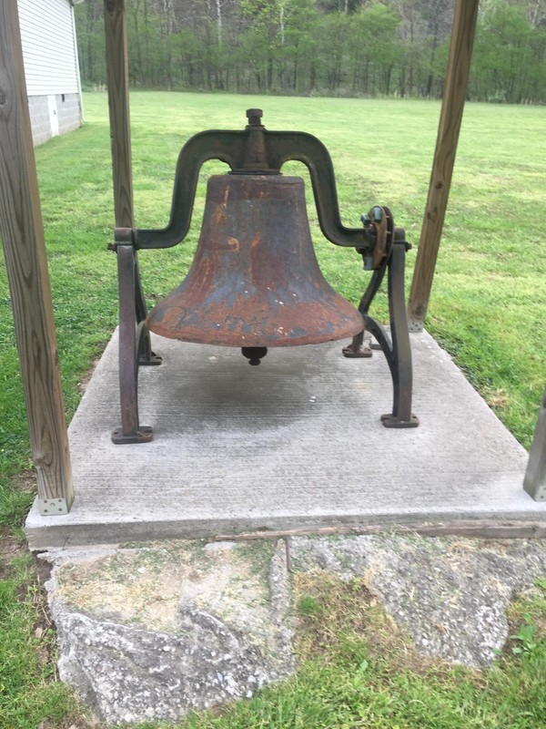 The iconic cast iron bell from the original Garrison Baptist Church.