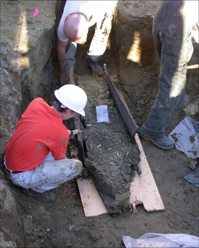 Uncovered coffin